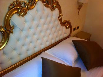 Always at least one golden piece in every room - ours was the headboard